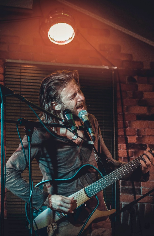 man-singing-with-guitar man-singing-with-guitar